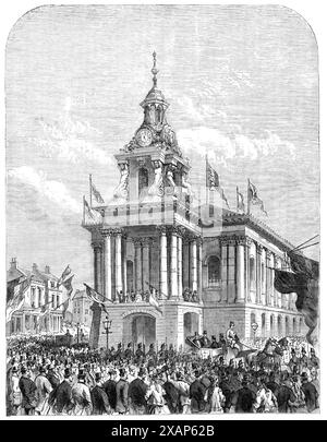 Earl de Grey et Ripon quittent la mairie de Burslem pour ouvrir le Wedgwood Memorial Institute, 1869. « L'institution a été officiellement inaugurée, mercredi, par Earl de Grey et Ripon, Lord Président du Conseil. La loi sur la gratuité des bibliothèques et des musées a été adoptée par les habitants dans le cadre de cette institution, qui comprendra également une école d'art et d'autres organismes éducatifs. Le bâtiment lui-même est entièrement construit en matériaux céramiques ; et la conception de l'architecte, Mr. R. Edgar, a été d'illustrer dans la façade le mode dans lequel la terre cuite et d'autres enrichissements Banque D'Images