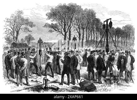 Expériences avec Norton's Patent tube-Wells, utilisé par notre armée en Abyssinie, 1868. Une invention adoptée par les Royal Engineers pour l'approvisionnement en eau des troupes britanniques en Abyssinie... c'est une invention américaine... le titulaire du brevet à Londres est Mr. J. L. Norton... les expériences were...in un champ près de la gare de Thames Ditton... où quarante ou cinquante messieurs avaient assemblé... le tube... était conduit dans le sol à environ 15 pieds. Ou 16 pieds, et l'appareil de pompage étant fixé, l'eau a été produite à la vitesse de 10 à 12 gallons par minute... [Un tube plus grand]... était également t Banque D'Images