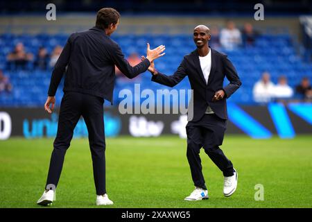 Sir Mo Farah (à droite) avant Soccer Aid for UNICEF 2024 à Stamford Bridge, Londres. Date de la photo : dimanche 9 juin 2024. Banque D'Images