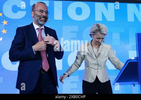 Bruxelles, Belgique. 09 juin 2024. Le président du PPE Manfred Weber et la présidente de la Commission européenne et candidate principale du PPE Ursula von der Leyen prononcent un discours lors d'une soirée d'élection du PPE après le vote pour l'élection du Parlement européen à Bruxelles, Belgique, le 9 juin 2024. Crédit : ALEXANDROS MICHAILIDIS/Alamy Live News Banque D'Images