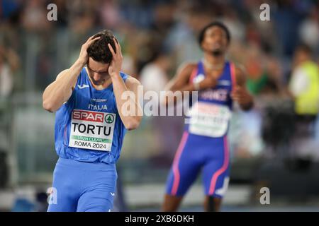 Rome, Italie. 10 juin 2024. L'Italien Filippo Tortu (G) réagit après la finale du 200m masculin aux Championnats d'Europe d'athlétisme de Rome 2024 à Rome, Italie, le 10 juin 2024. Crédit : Li Jing/Xinhua/Alamy Live News Banque D'Images