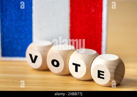 Voter en France. Symbole brodé de la France et cubes avec les mots vote, close up Banque D'Images