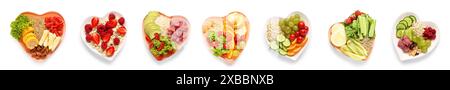 Collage de plaques en forme de cœur avec des produits sains sur fond blanc Banque D'Images