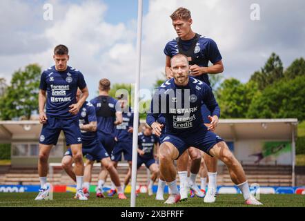 Freudenstadt, Tyskland. 12 juin 2024. Christian Eriksen, Jannik Vestergaard et Joakim Maehle lors de l'entraînement de l'équipe nationale de football Denmarks à Freudenstadt, en Allemagne, mercredi 12 juin 2024 crédit : Ritzau/Alamy Live News Banque D'Images