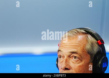 Le leader réformiste britannique Nigel Farage lors de LBC, Nick Ferrari au Breakfast Show à Global à Leicester Square, Londres, alors qu'il est sur la piste de la campagne électorale générale. Date de la photo : jeudi 13 juin 2024. Banque D'Images