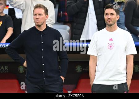 Munich, Allemagne. 14 juin 2024. Football, UEFA Euro 2024, Championnat d'Europe, Allemagne - Écosse, Tour préliminaire, groupe A, Journée 1, Football Arena Munich, Julian Nagelsmann (g) et l'entraîneur adjoint Benjamin Glück avant le match crédit : Sven Hoppe/dpa/Alamy Live News Banque D'Images