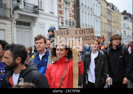 Lille, France. 15 juin 2024. Manifestation de rue en réaction à la situation politique en France, et contre le risque d’avoir une majorité d’extrême droite aux prochaines élections législatives. Lille, France, le 15 juin 2024. Photo Christophe forestier/ABACAPRESS. COM Credit : Abaca Press/Alamy Live News Banque D'Images