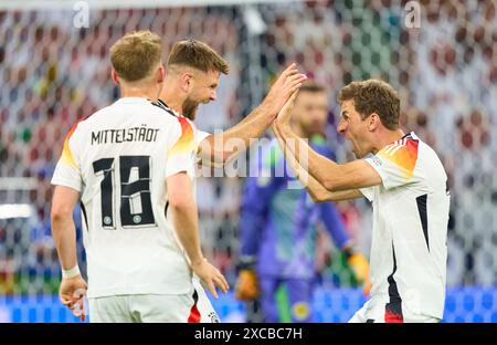Niclas Füllkrug, DFB 9 célèbre son but hors jeu, heureux, rire, célébration, avec Thomas Müller, Mueller, DFB 13 dans le match en phase de groupes ALLEMAGNE - ECOSSE 5-1 des Championnats d'Europe de l'UEFA 2024 le 14 juin 2024 à Munich, Allemagne. Photographe : Peter Schatz Banque D'Images