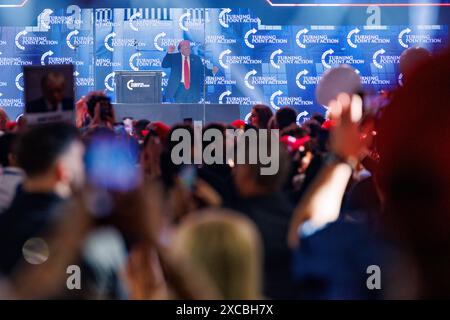 Detroit, États-Unis. 15 juin 2024. L’ancien président Donald Trump prend la parole lors d’un congrès Turning point action à Detroit, Michèle, le 15 juin 2024. (Photo de Andrew Roth/Sipa USA) crédit : Sipa USA/Alamy Live News Banque D'Images