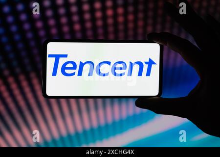 Le logo Tencent est affiché sur un smartphone, vu dans cette illustration photo. Prise à Bruxelles, Belgique. Le 16 juin 2024. (Jonathan Raa / Sipa USA) *** strictement à des fins d'actualités éditoriales *** Banque D'Images