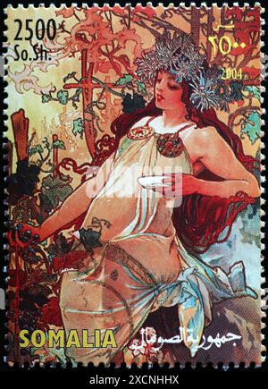 Illustration par Alfons Mucha sur timbre de Somalie Banque D'Images