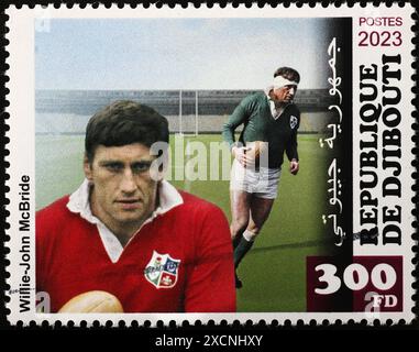 Le footballeur de rugby Willie-John McBride sur timbre-poste britannique Banque D'Images