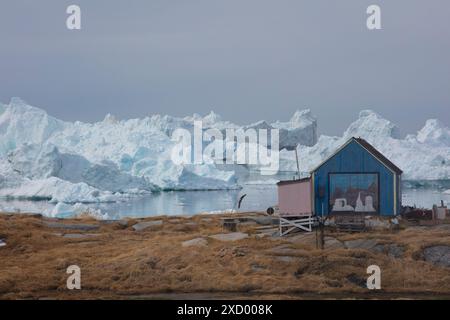 Oqaatsut - un petit village isolé au nord d'Ilulissat dans l'ouest du Groenland. Banque D'Images