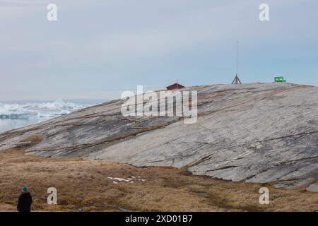 Oqaatsut - un petit village isolé au nord d'Ilulissat dans l'ouest du Groenland. Banque D'Images