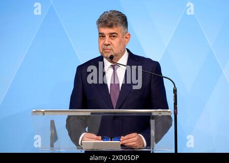 Der rumänische premier ministre Marcel Ciolacu nimmt an einer abschließenden Pressekonferenz teil. DAS bayerische und das rumänische Kabinett tagten zusammen in der bayerischen Landeshauptstadt. München, 18.06.2024 Bayern Deutschland *** le premier ministre roumain Marcel Ciolacu assiste à une conférence de presse finale les cabinets bavarois et roumain se sont réunis dans la capitale bavaroise Munich, 18 06 2024 Bavière Allemagne Copyright : xDwixAnoraganingrumx Banque D'Images