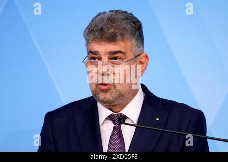 Der rumänische premier ministre Marcel Ciolacu nimmt an einer abschließenden Pressekonferenz teil. DAS bayerische und das rumänische Kabinett tagten zusammen in der bayerischen Landeshauptstadt. München, 18.06.2024 Bayern Deutschland *** le premier ministre roumain Marcel Ciolacu assiste à une conférence de presse finale les cabinets bavarois et roumain se sont réunis dans la capitale bavaroise Munich, 18 06 2024 Bavière Allemagne Copyright : xDwixAnoraganingrumx Banque D'Images