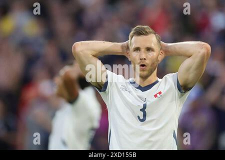 Cologne, Allemagne. 19 juin 2024. Football : Championnat d'Europe, Écosse - Suisse, tour préliminaire, groupe A, jour de match 2, Köln Stadion, Silvan Widmer de Suisse réagit. Crédit : Rolf Vennenbernd/dpa/Alamy Live News Banque D'Images