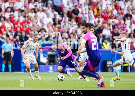 Stuttgart, Allemagne. 19 juin 2024. Stuttgart, MHP Arena, 19.06.2024, l'allemand Jamal Musiala court avec le ballon pendant le match Championnat d'Europe UEFA 2024 Allemagne contre Hongrie. Crédit : Mika Volkmann/Alamy Live News Banque D'Images