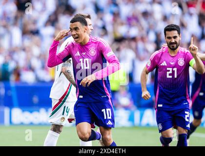 Stuttgart, Allemagne. 19 juin 2024. Stuttgart, MHP Arena, 19.06.2024 : L'allemand Jamal Musiala célèbre avoir marqué le but 1:0 lors du match Championnat d'Europe UEFA 2024 Allemagne contre Hongrie. Crédit : Mika Volkmann/Alamy Live News Banque D'Images