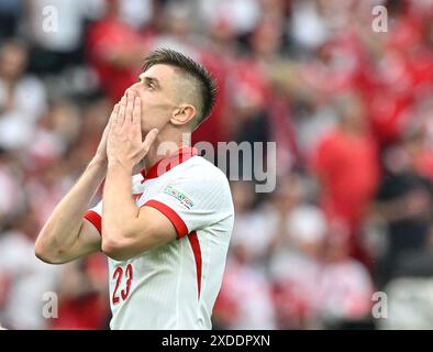 Berlin, Allemagne. 21 juin 2024. Krzysztof Piatek réagit lors du match UEFA Euro 2024 Groupe d entre la Pologne et l'Autriche à Berlin, en Allemagne, le 21 juin 2024. Crédit : Ren Pengfei/Xinhua/Alamy Live News Banque D'Images