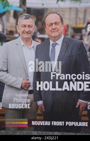 Corrèze, France. 23 juin 2024. François Hollande candidat aux élections législatives des 30 juin et 7 juillet 2024 en Corrèze. Affiche électorale de l'ancien président de la République française François Hollande candidat à la députation de la 1ère circonscription du département de la Corrèze. Il fait partie de la coalition électorale 'Nouveau Front populaire/Nouveau Front populaire'. Ces élections législatives anticipées en France font suite à la dissolution de l'Assemblée nationale par le président de la République française Emmanuel Macron. Emmanuel Macron a décidé de dissoudre l'Assemblée nationale en réponse à la Banque D'Images