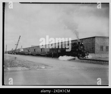 Elmira Holding and Reconsignation point, Elmira, New York. Entrepôt et train. Collection Gottscho-Schleisner Banque D'Images