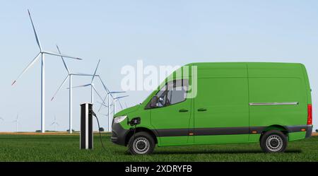 Chargement de fourgon électrique vert et éoliennes dans un fond. Banque D'Images