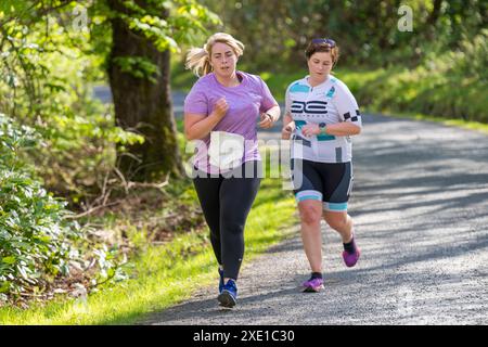 Le seul défi amusant multisport féminin, qui a eu lieu au Gartan Outdoor Education & Training Centre , Churchill, Letterkenny, Co. Donegal, Irlande. Banque D'Images