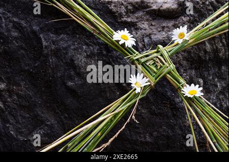 Saint Brigids Cross irlandais symbole païen de la maison bénissant la protection contre le mal et le feu. Traditionnellement fabriqué en Irlande le premier jour d'Imbolc à Spring St. Banque D'Images