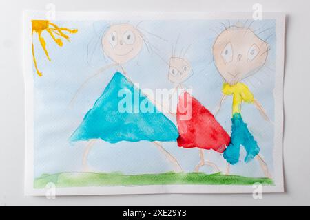 Dessin pour enfants de maman, papa et enfant, dans des peintures à l'aquarelle. Une famille heureuse Banque D'Images