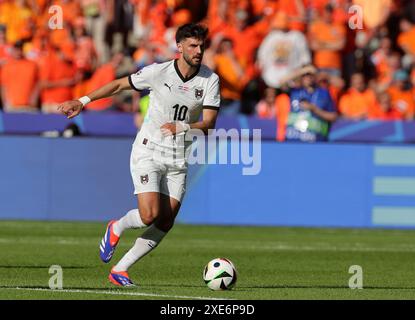 BERLIN, ALLEMAGNE - JUIN 25 : Florian Grillitsch de l'Autriche lors du match de la phase de groupes de l'UEFA EURO 2024 opposant les pays-Bas et l'Autriche à l'Olympiastadion le 25 juin 2024 à Berlin, Allemagne. © diebilderwelt / Alamy Stock Banque D'Images