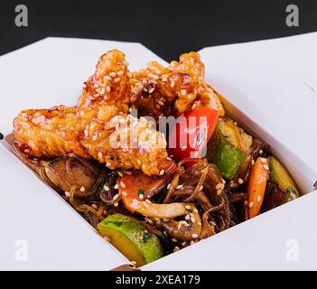 Poulet asiatique en sauce aigre-douce Banque D'Images