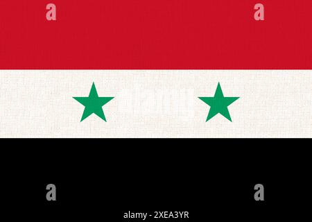 Drapeau de Syrie. Drapeau syrien sur la texture du tissu. Symbole national de la Syrie. République arabe syrienne. Asiatique Banque D'Images