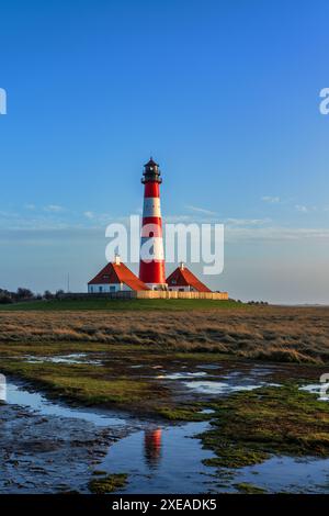 Phare de Westerheversand sur la mer du Nord un point de repère de la péninsule d'Eiderstedt en Allemagne. Banque D'Images