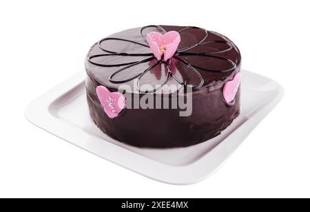 gâteau en glaçage au chocolat isolé sur blanc Banque D'Images