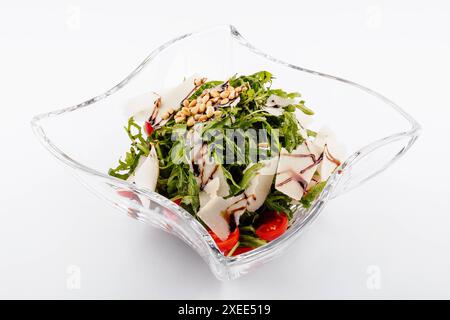 Salade de roquette avec tournesol et saupoudré de parmesan râpé Banque D'Images