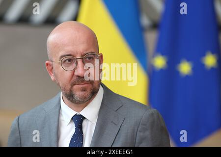 Bruxelles, Belgique. 27 juin 2024. Le président du Conseil européen Charles Michel est vu devant un sommet du Conseil européen à Bruxelles, Belgique, le 27 juin 2024. L'Union européenne (UE) et l'Ukraine ont signé des accords de sécurité lors d'un sommet du Conseil européen à Bruxelles jeudi. Le président ukrainien Volodymyr Zelensky a assisté au sommet et a signé le pacte de sécurité lors d'une cérémonie en compagnie du président du Conseil européen Charles Michel et de la présidente de la Commission européenne Ursula von der Leyen. Crédit : Zhao Dingzhe/Xinhua/Alamy Live News Banque D'Images