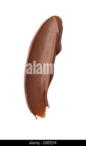 Frottis de pâte de chocolat savoureuse sur fond blanc Banque D'Images