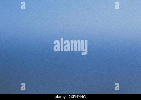 Image de haute qualité présentant une texture granuleuse avec un dégradé de bleu apaisant Banque D'Images