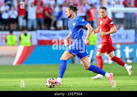 Adrien Rabiot (14 ans) de France photographié lors d'un match de football entre les équipes nationales de France et de Pologne le troisième jour du Groupe d en phase de groupes du tournoi UEFA Euro 2024 , le mercredi 25 juin 2024 à Dortmund , Allemagne . PHOTO SPORTPIX | David Catry Banque D'Images