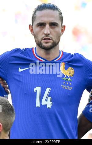 Adrien Rabiot (14 ans) de France photographié lors d'un match de football entre les équipes nationales de France et de Pologne le troisième jour du Groupe d en phase de groupes du tournoi UEFA Euro 2024 , le mercredi 25 juin 2024 à Dortmund , Allemagne . PHOTO SPORTPIX | David Catry Banque D'Images