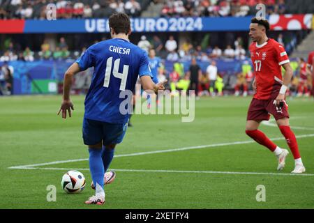 Berlin, Allemagne, 29, juin 2024. Federico Chiesa passe le ballon lors du match entre la Suisse et l'Italie. UEFA Euro 2024 Allemagne. Ronde de 16. Crédit : Fabideciria/Alamy Live News Banque D'Images