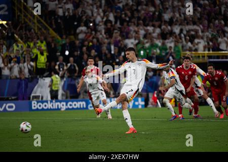 Dortmund, Allemagne. 29 juin 2024. L'Allemand Kai Havertz (avant) tire sur la pénalité lors du match de l'UEFA Euro 2024 Round of 16 entre l'Allemagne et le Danemark à Dortmund, Allemagne, le 29 juin 2024. Crédit : Xiao Yijiu/Xinhua/Alamy Live News Banque D'Images