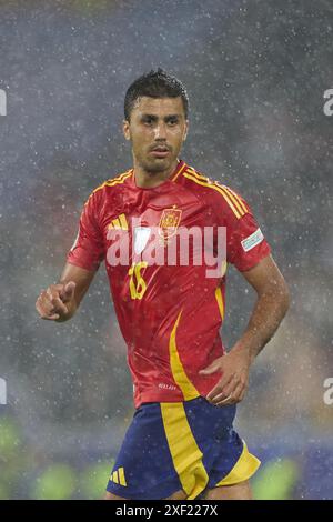 Cologne. 30 juin 2024. Rodri de Spian participe à la manche de l'UEFA Euro 2024 du 16e match opposant l'Espagne et la Géorgie à Cologne, en Allemagne, le 30 juin 2024. Crédit : Meng Dingbo/Xinhua/Alamy Live News Banque D'Images