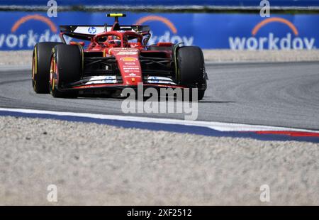 Spielberg, Autriche. 30 juin 2024. Carlos Sainz, pilote espagnol Ferrari, participe au Grand Prix d'Autriche de formule 1 à Spielberg, Autriche, le 30 juin 2024. Crédit : HE Canling/Xinhua/Alamy Live News Banque D'Images