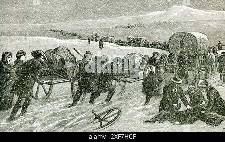 Cette illustration de 1896 montre un chariot mormon Comoany traversant les plaines. Les pionniers mormons des charrettes ont participé à la migration des membres de l'Église de Jésus-Christ des Saints des derniers jours à Salt Lake City, Utah, entre 1856 et 1860. Ils utilisaient des chariots à deux roues pour transporter leurs effets personnels. Deux des compagnies, les compagnies Willie et Martin, ont commencé leur voyage dangereusement à la fin de 1856 et ont été prises par la neige abondante et les températures sévères dans le centre du Wyoming. Malgré un effort de sauvetage spectaculaire, plus de 210 des 980 pionniers de ces deux entreprises sont morts le long de la Banque D'Images