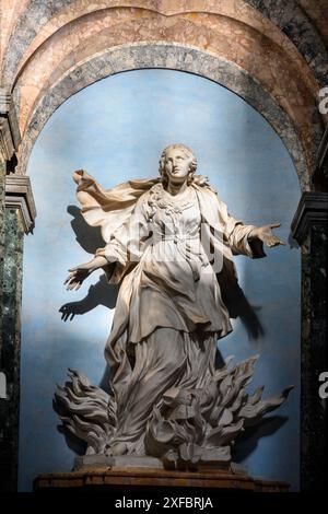 Statue du martyre de Sainte Agnès sur le bûcher, Sant'Agnese in Agone, 1660, par Ercole Ferrata église Sant'Agnese, Piazza Navona, Rome, Italie Banque D'Images