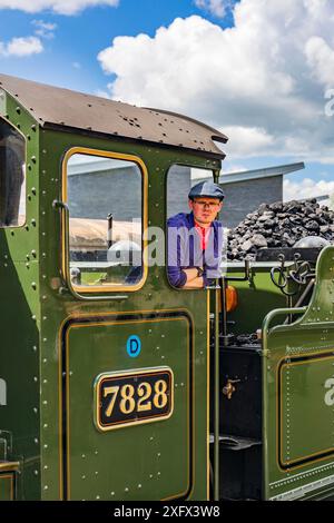 Le pompier du loco 7828 « Odney Manor » préservé de l'ex-GWR à vapeur à la station Minehead au West Somerset Railway Steam Gala, Angleterre, Royaume-Uni Banque D'Images