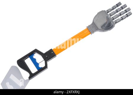 Main d'aide, bras robotique, jouet, grattoir arrière, atteer, pince ou griffe ! Banque D'Images