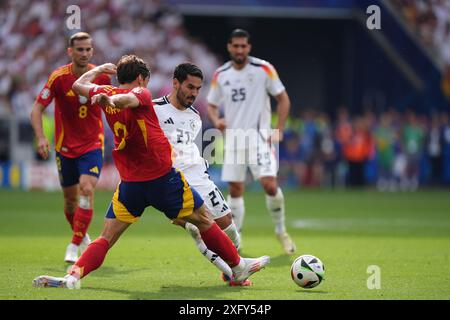 L’Allemand Ilkay Gundogan en action contre l’Espagnol Robin le Normand lors de l’UEFA Euro 2024, quart de finale à la Stuttgart Arena de Stuttgart, Allemagne. Date de la photo : vendredi 5 juillet 2024. Banque D'Images